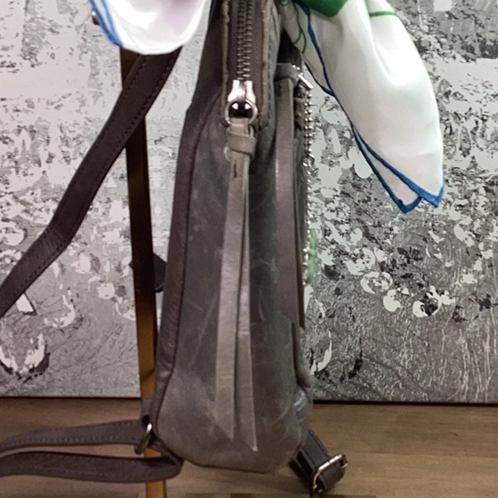 The Sak Leather Gray/ Green Embossed Leather Backpack